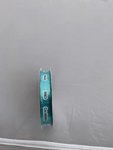 [439393] 439393   W SARINA METALLIC TURQUOISE   5/8" X 25 YD  120 Rolls Per Case